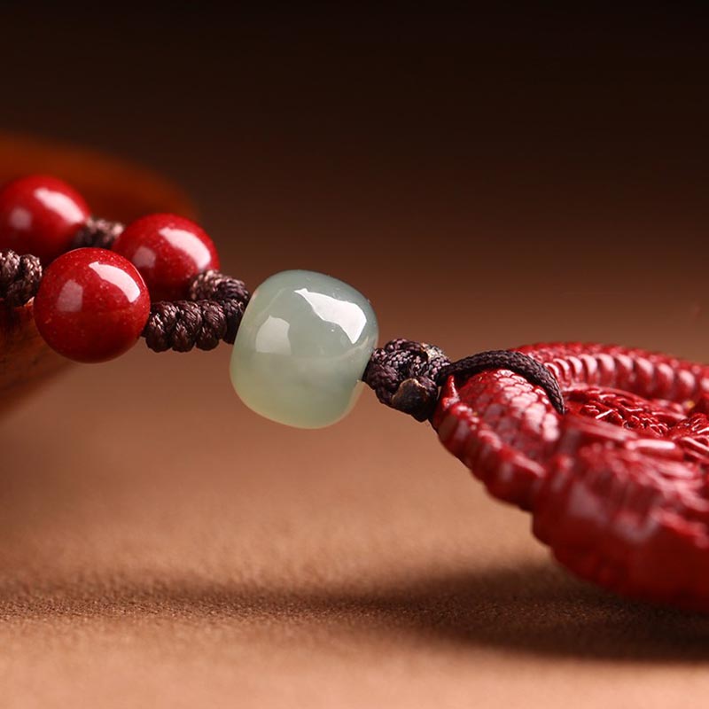Cinnabar Hetian Jade Dragon Necklace - jade accent bead connecting carved pendant, braided cord