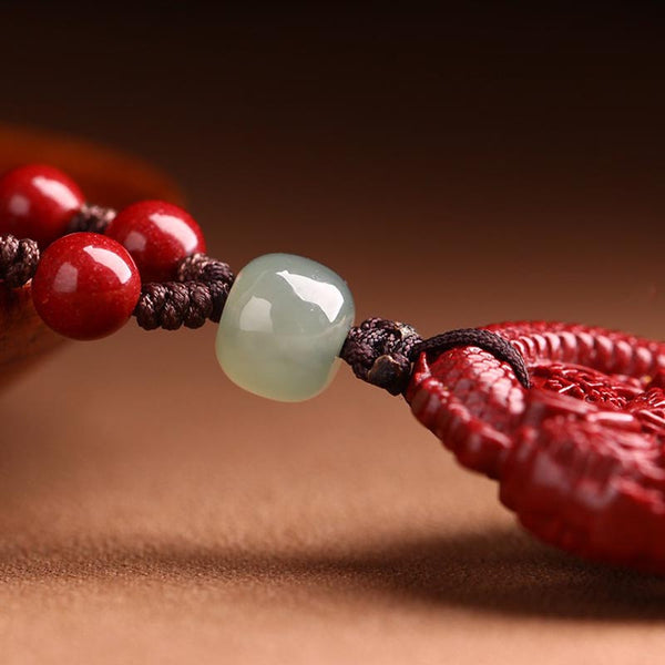 Cinnabar Hetian Jade Dragon Necklace - jade accent bead connecting carved pendant, braided cord