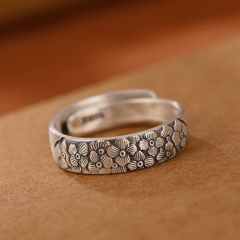 Anillo ajustable de flor de loto y ciruelo "Iluminación" de plata 999