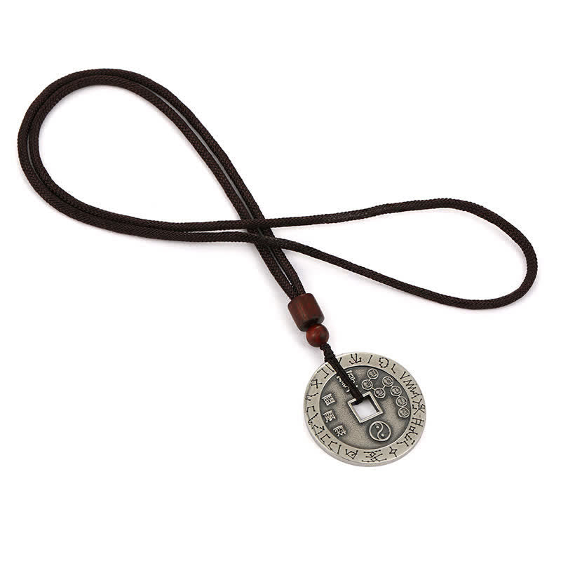 Bagua Yin Yang Obsidian Necklace - looped cord with engraved coin pendant on white background