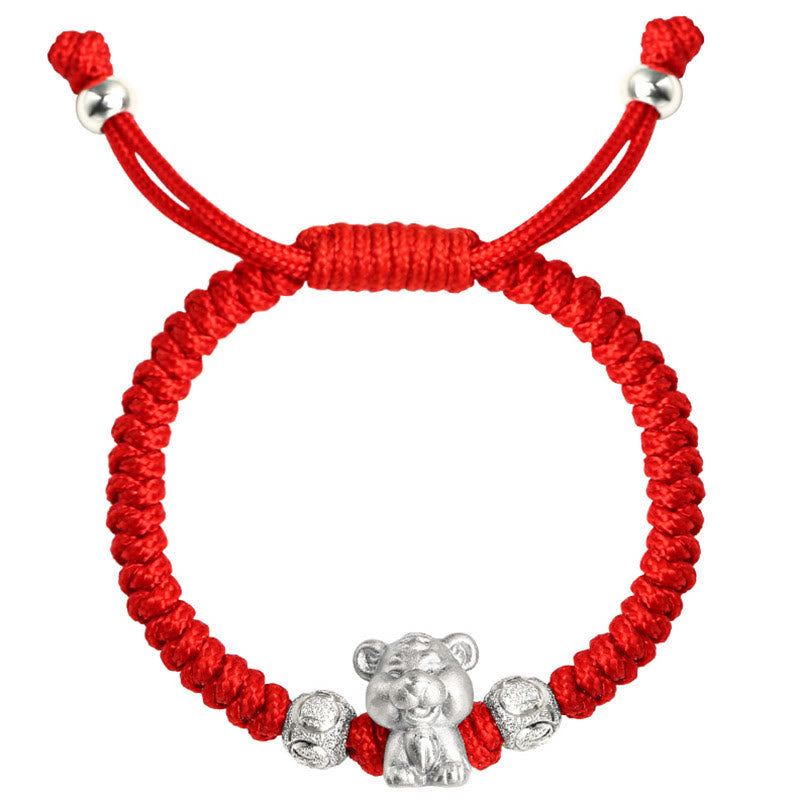 999 Sterling Silver Zodiac Red Rope Kids Bracelet - Silver rabbit charm on red cord on teal velvet, adjustable lucky bracelet