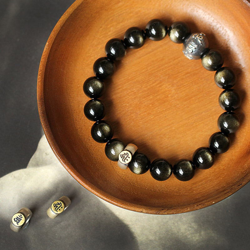 Zodiac Natal Buddha Obsidian Silver Bracelet - Wooden bowl with loose mantra beads showing customization