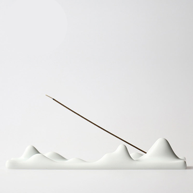 Mountain Cloud Incense Holder – White ceramic peaks with upright stick, minimalist