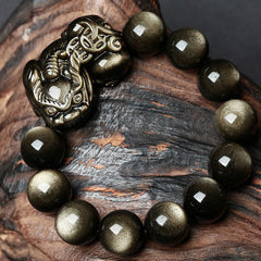 Golden Obsidian Bracelet – Beads with carved PiXiu on rustic wood, golden shimmer stones, protection