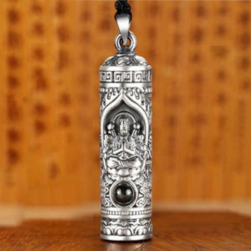Chinese Zodiac Natal Buddha Projection Necklace – Front view on wooden surface, antique silver finish, devotional craftsmanship