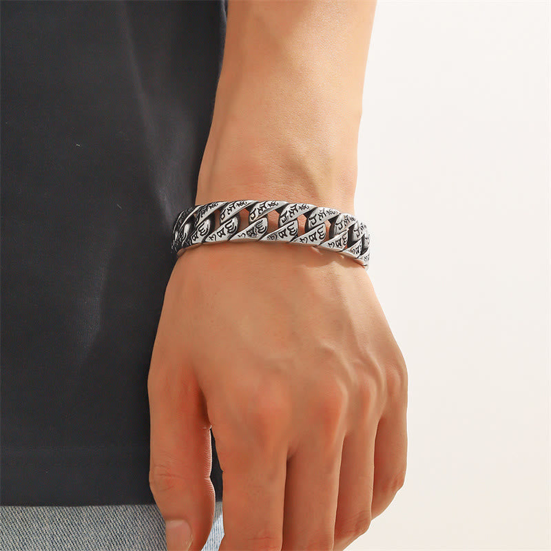 Tibetan Om Mani Padme Hum Cuff Bangle – worn on male wrist, silver cuban chain with engraving, lifestyle shot