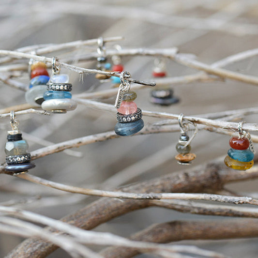 Zen Cairn Crystal Pendant – stacked gemstone charms in blues pinks ambers hanging from dried branches, boho jewelry