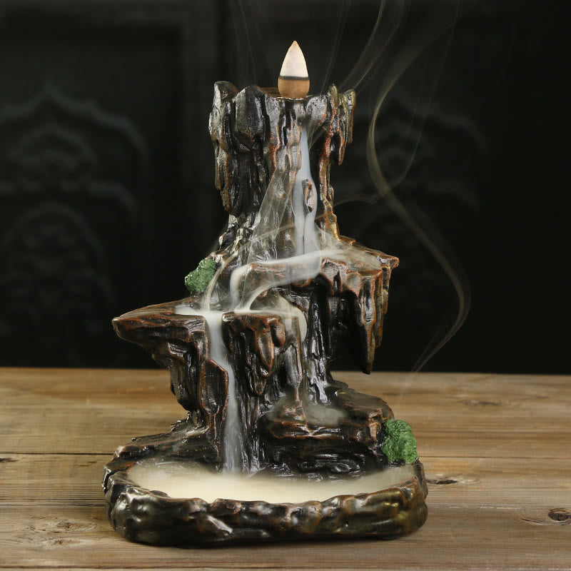 Backflow Incense Burner – smoke waterfall cascading on wood table, serene