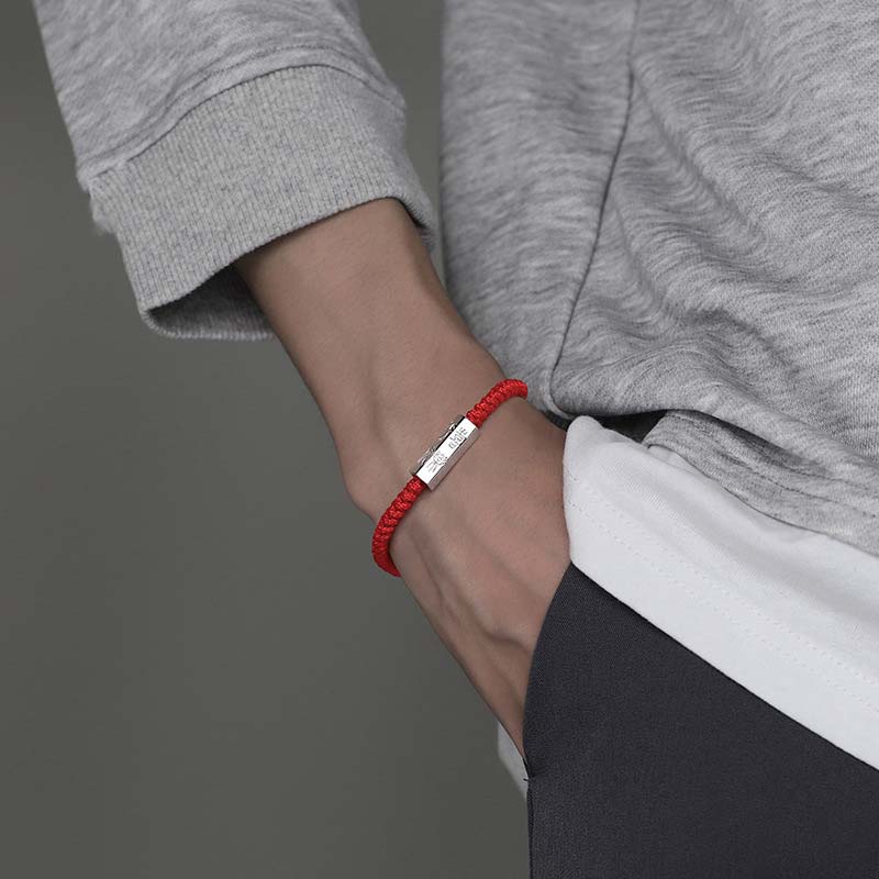 925 Sterling Silver Letter Blessing String Bracelet – Worn on male wrist in casual gray hoodie showing everyday street style with silver letter charm