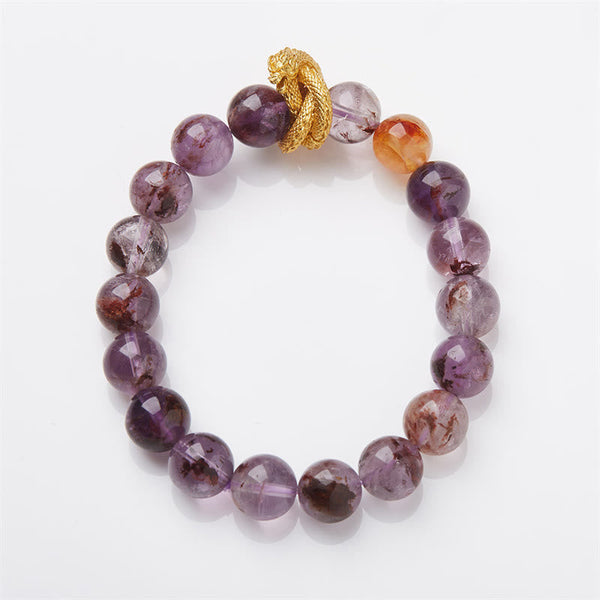 Purple Phantom Quartz Dragon Bracelet – Overhead shot showing ametrine color zoning and orange accent, spiritual