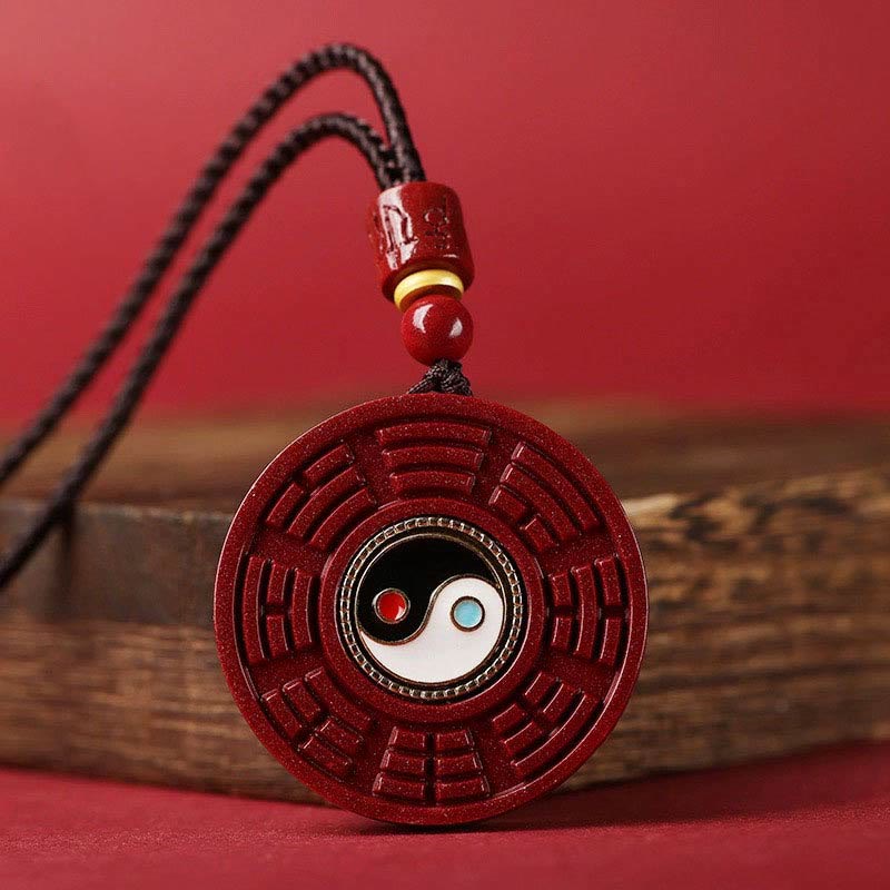 Cinnabar Bagua Rotatable Yin Yang Necklace – Red cinnabar Bagua pendant with Yin-Yang center on wood, Taoist amulet
