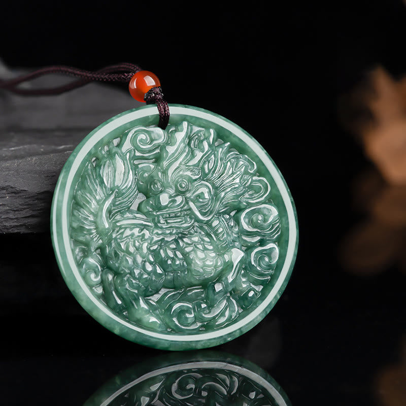 Jade Dragon Pendant – Green jadeite dragon medallion on dark wood with mirror reflection, wealth protection jewelry