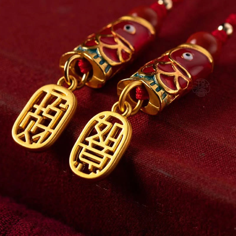 Koi Fish Cinnabar Ruyi Phone Charm – cinnabar koi with gold ruyi on phone, detailed carving close-up, wealth luck