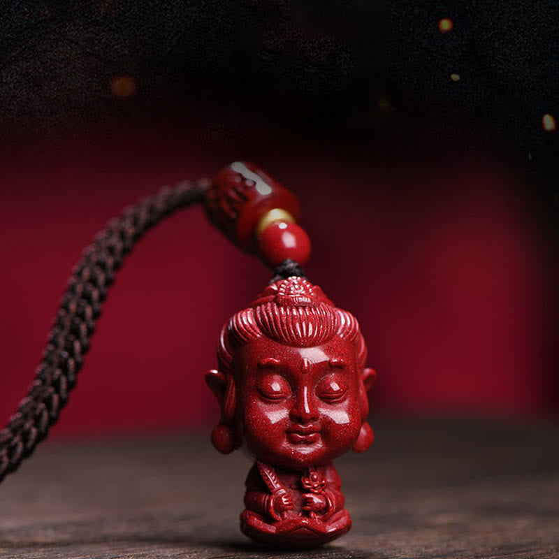 Chinese Zodiac Cinnabar Pendant – Red Buddha figure against crimson studio backdrop, meditation necklace