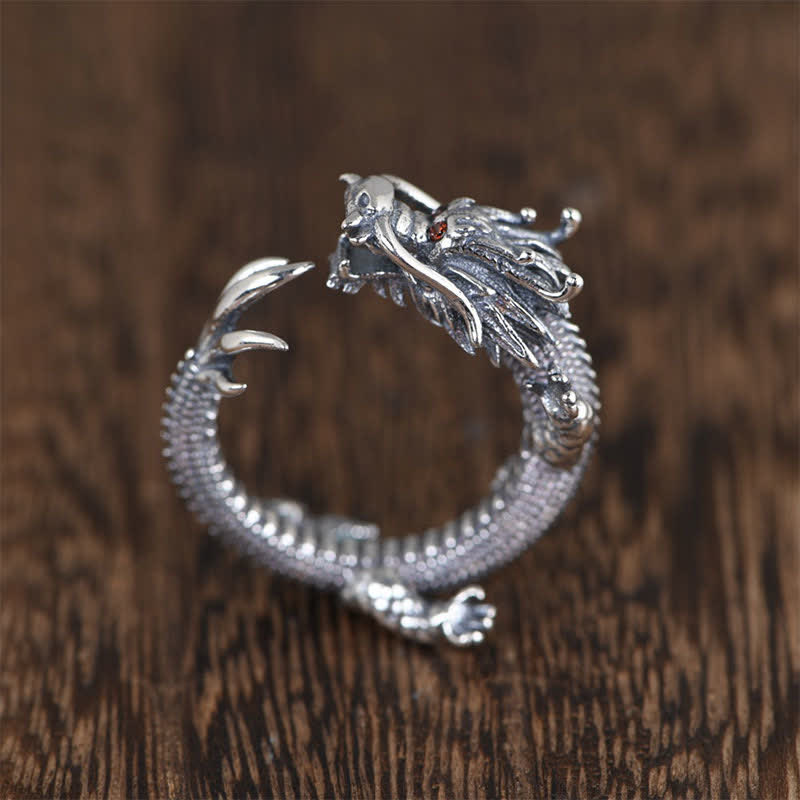 925 Sterling Silver Dragon Ring – Three-quarter view of open band with horned dragon head and red stone eyes, Mythical