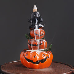 Halloween pumpkin ghost backflow incense burner, three stacked jack-o-lanterns with cascading white smoke, ghost topper – backflow incense burner