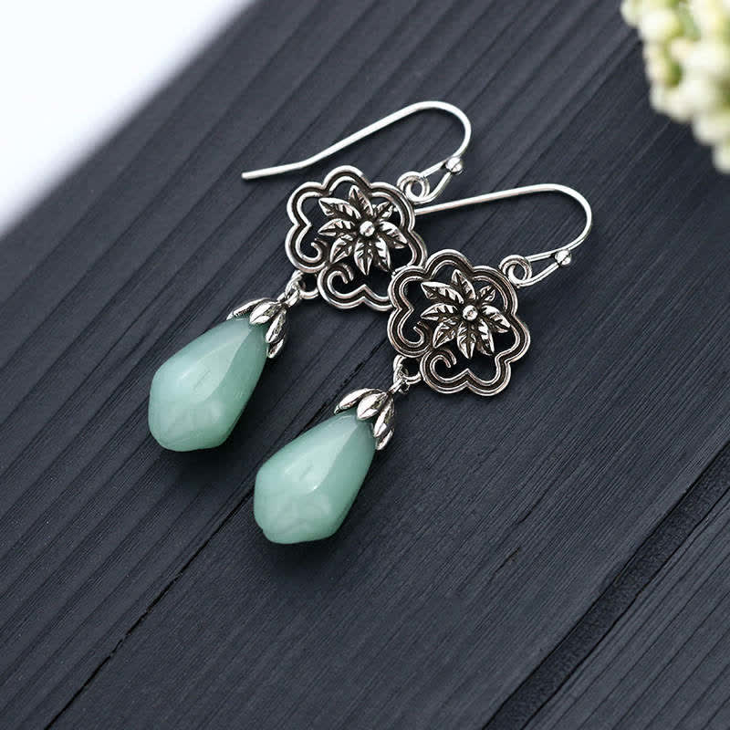 Magnolia Flower Jade Prosperity Dangle Earrings, angled view, earring jewelry