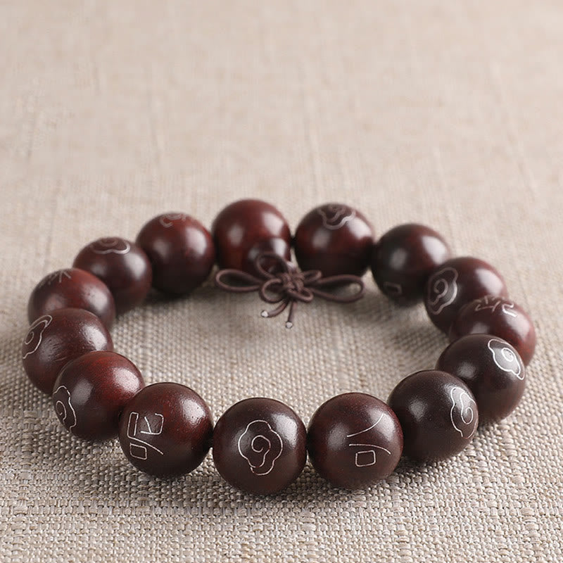 Sterling Silver Sandalwood Mantra Bracelet – eye-level shot showing inlaid bead patterns, meditation bracelet