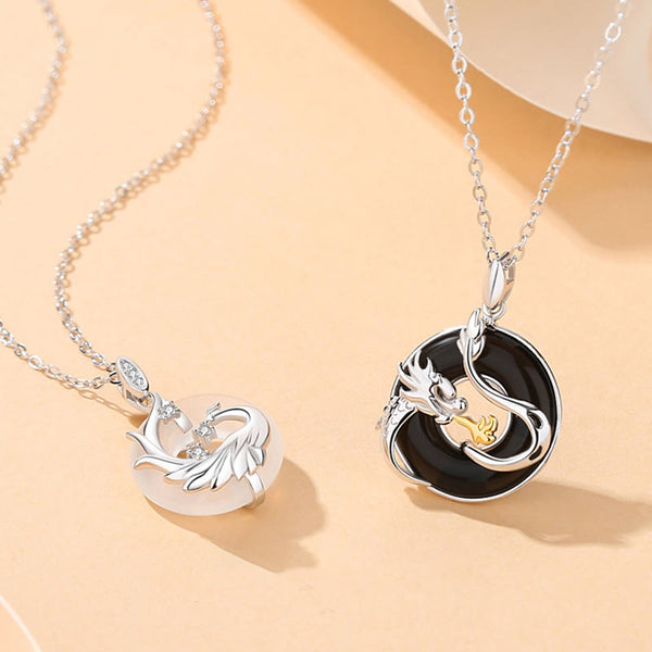 Black Onyx Dragon Phoenix Pendant - silver dragon on black stone paired with phoenix on white jade, Balance