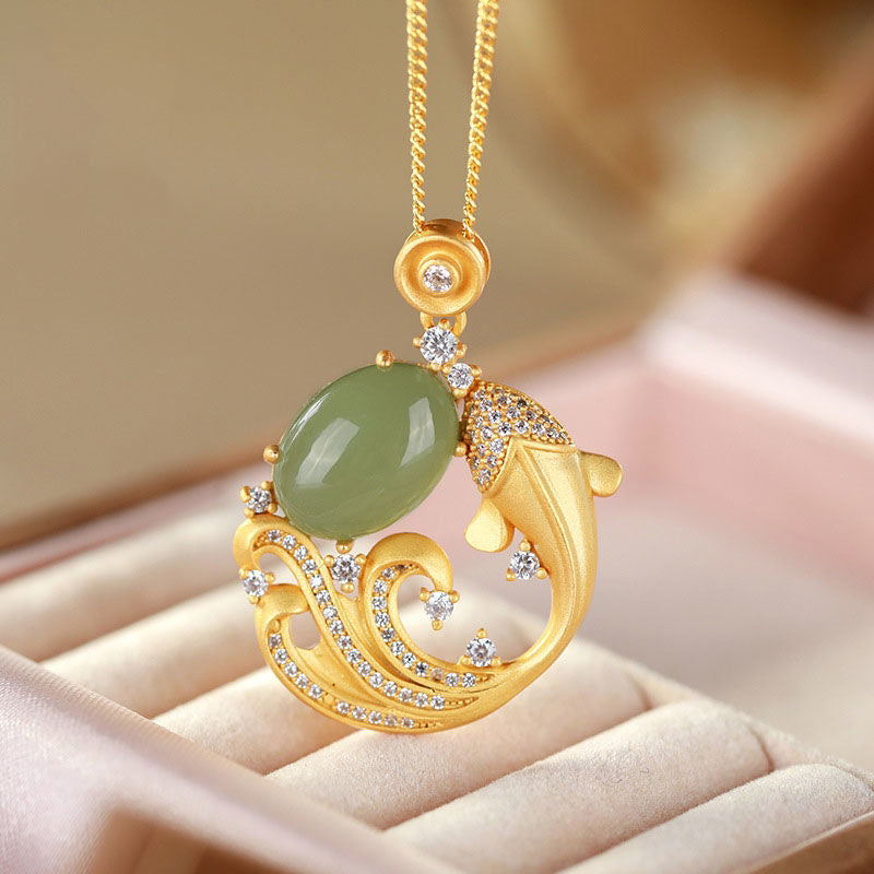 Cyan Jade Koi Fish Healing Necklace Pendant – front view of jade koi pendant on cord, calm luck jewelry
