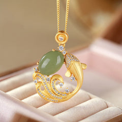 Cyan Jade Koi Fish Healing Necklace Pendant – front view of jade koi pendant on cord, calm luck jewelry