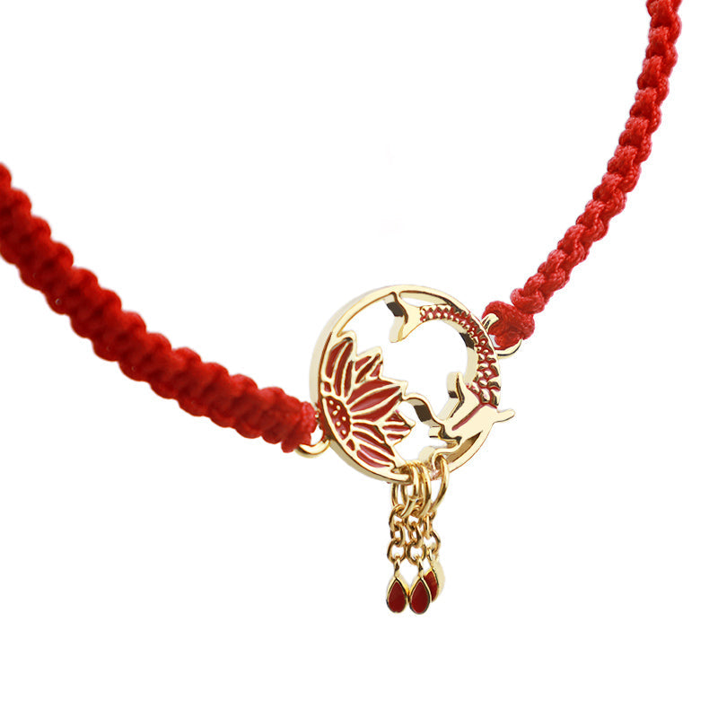 Tibetan Red String Koi Fish Bracelet – openwork koi lotus medallion, triple teardrop dangles, diagonal cord on white