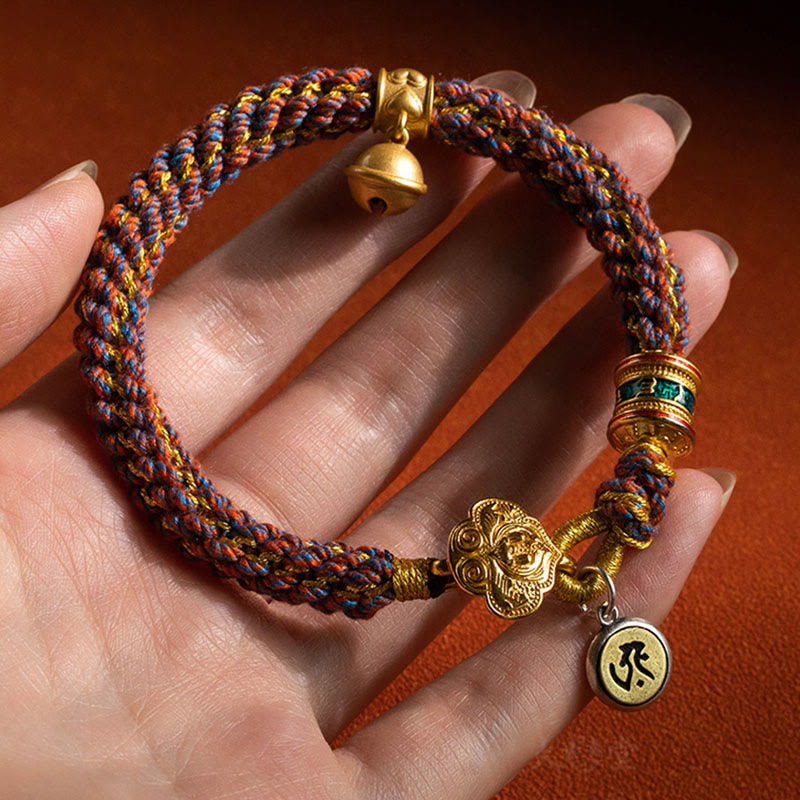 Om Mani Padme Hum Braided Bracelet – Hand-held display showing ruyi clasp and full braided cord construction