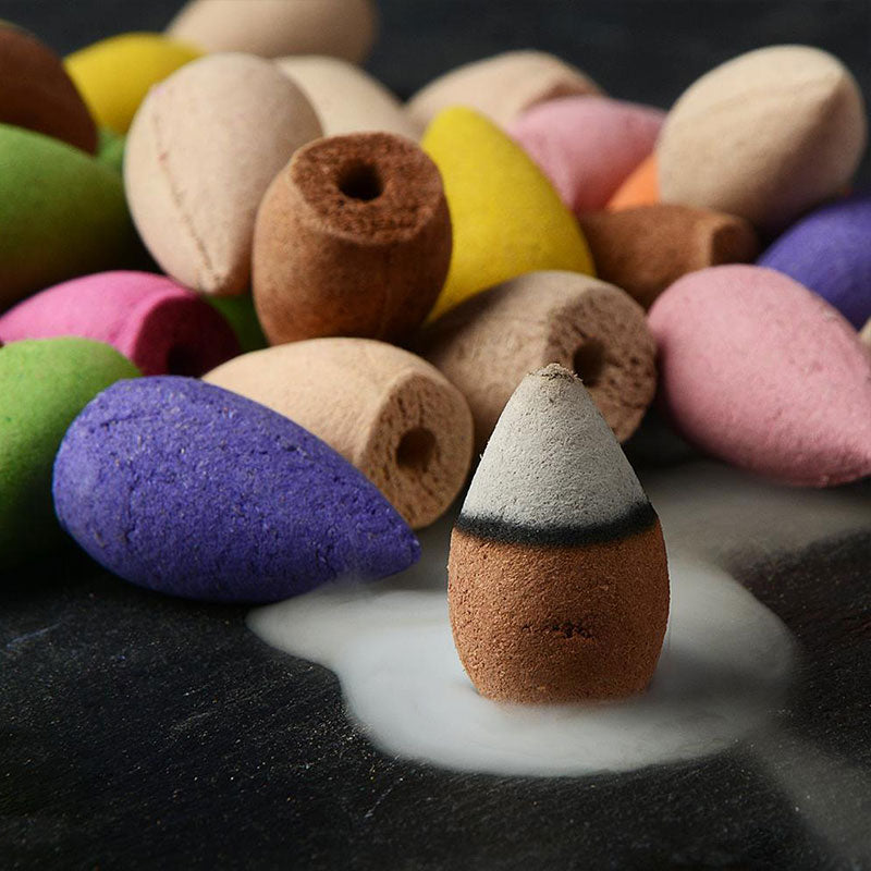 Tibetan Lotus Incense Burner – Five colorful cones on tree stump with smoke, incense cones