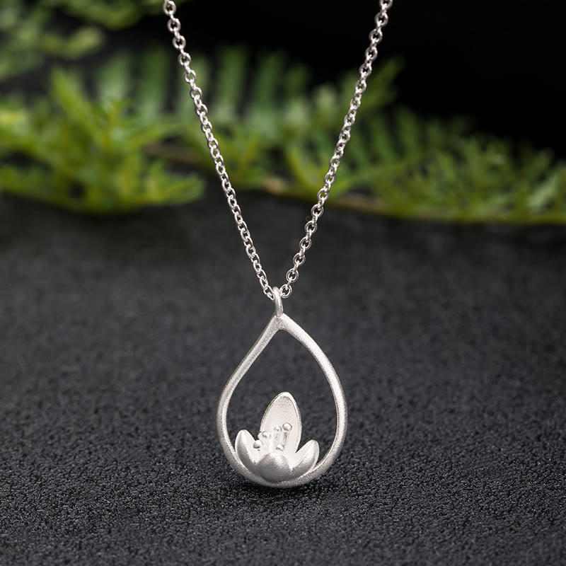 Sterling Silver Lotus Pendant – Teardrop frame with lotus on dark stone, Spiritual