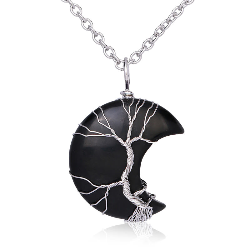 Quartz Crystal Moon Tree of Life Pendant – black obsidian crescent with silver wire tree on white, protection healing