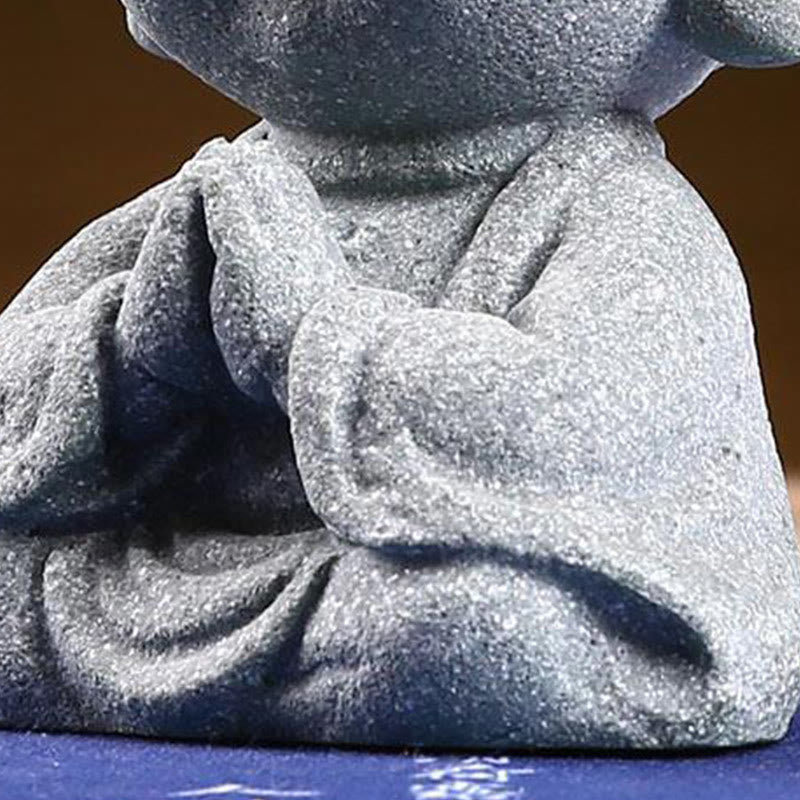 Meditation Praying Buddha Statue – indoor shelf with succulent plants and Buddha, nature corner