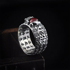 PiXiu Red Garnet Wealth Ring – Reverse side showing interior Chinese engravings and coin motifs, lucky ring