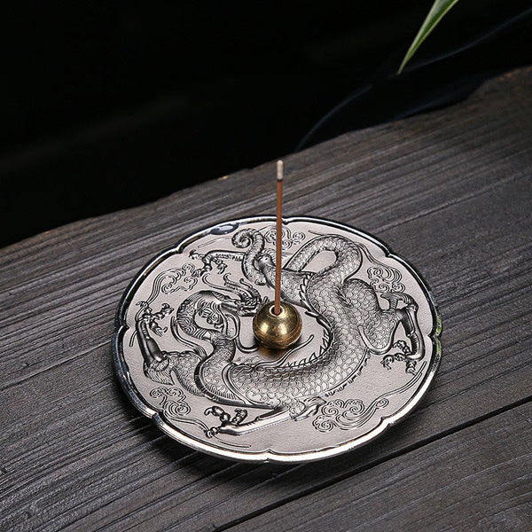 Round Dragon Copper Incense Burner - Silver plate with dragon relief and brass holder on dark wood, zen ritual