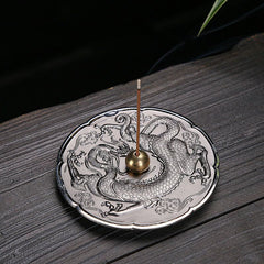 Round Dragon Copper Incense Burner - Silver plate with dragon relief and brass holder on dark wood, zen ritual