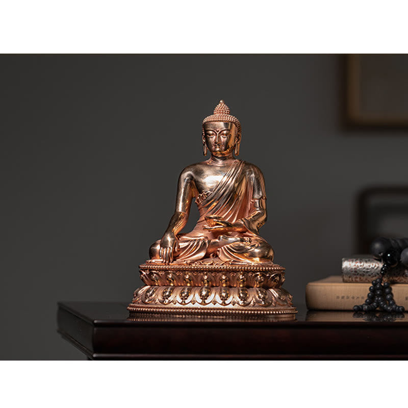 Shakyamuni Copper Statue – earlobe detail with hole indicating royal past then renunciation, iconography