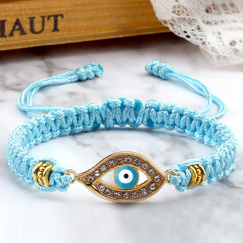 Turquoise cord evil eye bracelet with gold crystal pave evil eye charm, marble styling
