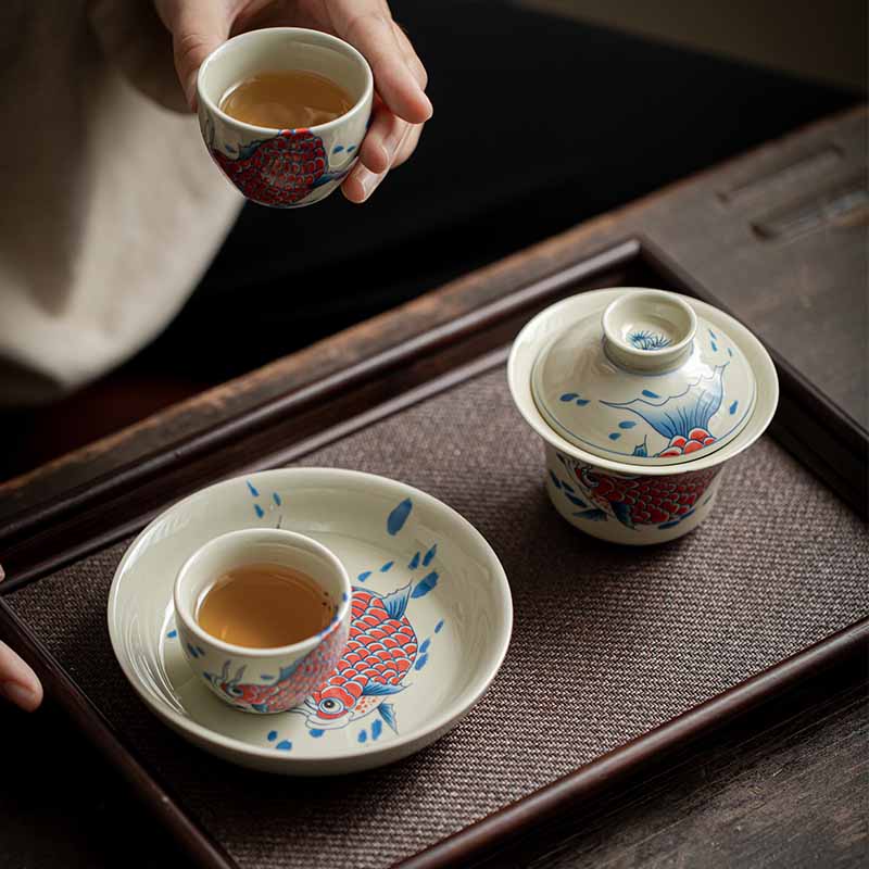 Koi Fish Gaiwan – lid off held beside cup showing all parts, Chinese tea set