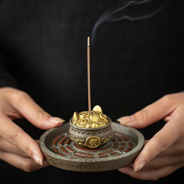 Bagua Ceramic Incense Burner – Held in both hands with burning incense smoke, gold pixiu holder
