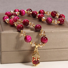 Tiger Eye Pixiu Fox Money Bag Bracelet - fuchsia tiger eye beaded stretch bracelet with gold-embellished Pixiu charm and champagne faceted crystal spacers, single strand feng shui wealth jewelry