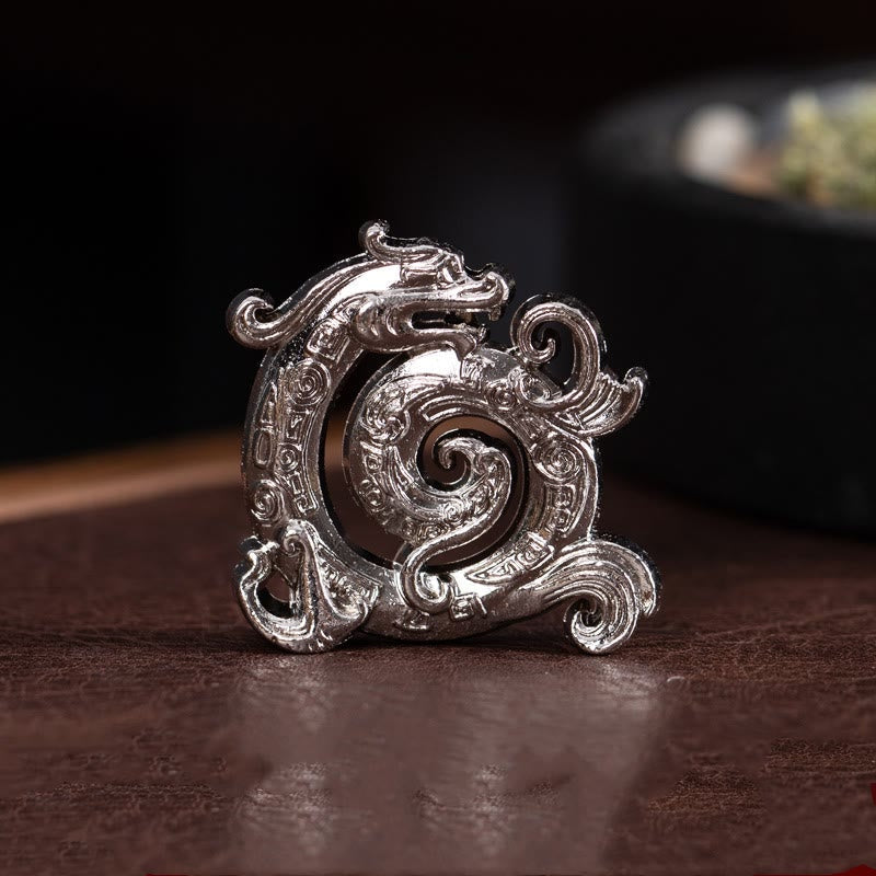 Mini Dragon Incense Burner – Polished silver coiled dragon ornament with traditional cloud scroll engravings, Serene