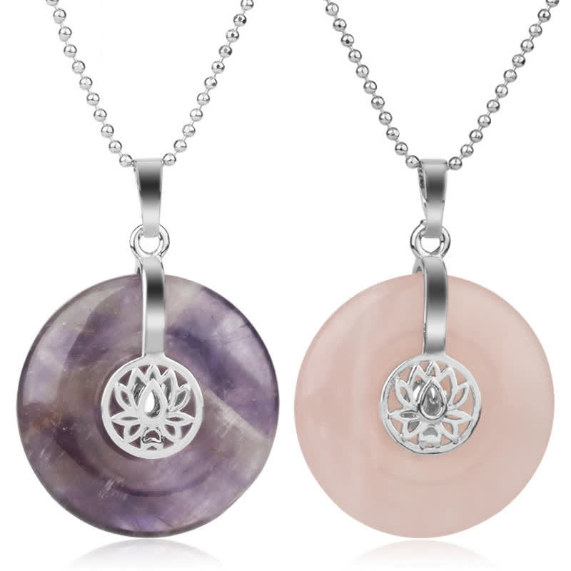 Crystal Amethyst Pink Crystal Lotus Necklace – Purple amethyst and pink rose quartz donut pendants on white background, healing crystals