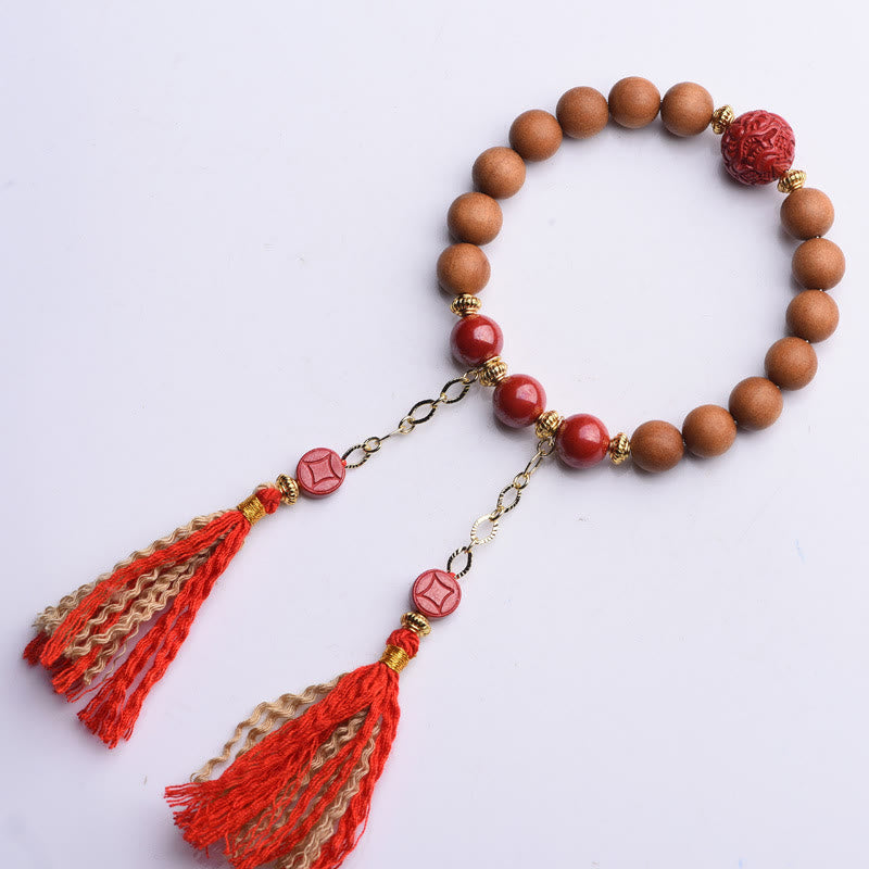 Peach Wood PiXiu Wealth Bracelet – Wood and red bead bracelet with gold spacers on dark wood, protection
