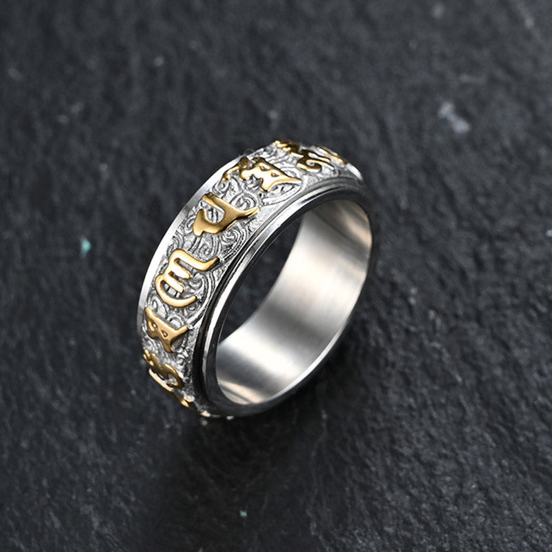 Om Mani Padme Hum Ring – silver spinner band with gold Sanskrit engraving on dark stone, men's meditation jewelry Main image