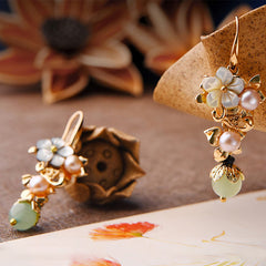 14K Gold Tridacna Pearl Aventurine Drop Earrings – White Tridacna Stone Flower Pearl Green Bead, angled view, earring jewelry