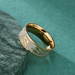 Dragon Titanium Steel Ring – Gold band on dark slate showing etched pattern, Masculine