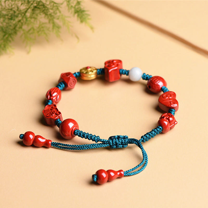 Cinnabar Laughing Buddha Bracelet – close-up Laughing Buddha face on gourd pendant, prosperity charm