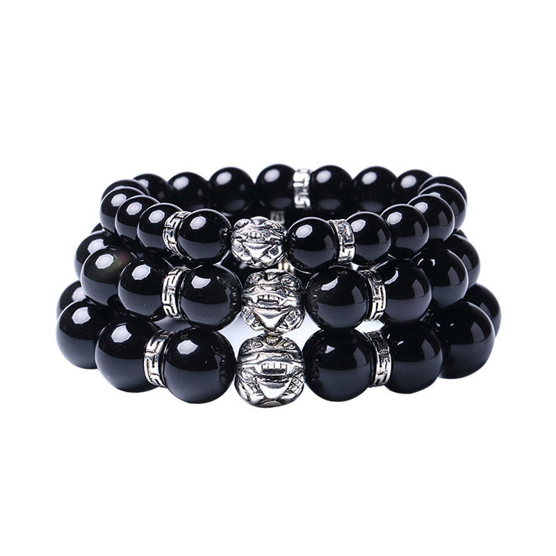 Rainbow Obsidian Bracelet – Three stacked bracelets with silver PiXiu on white background, set