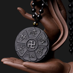 Black Obsidian Swastika Mantra Necklace - On Buddha hand sculpture, lotus petal pendant with gold accent bead, spiritual necklace