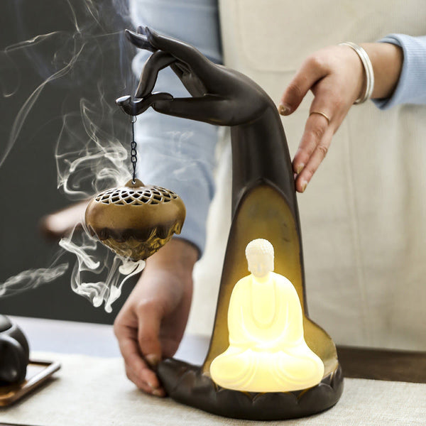 LED Buddha Hand Backflow Burner - front view with lattice censer and glowing seated Buddha