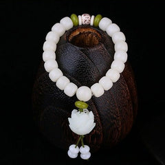Natural White Bodhi Seed Bracelet – Drum-shaped beads with olive green spacers and carved lotus charm, zen jewelry